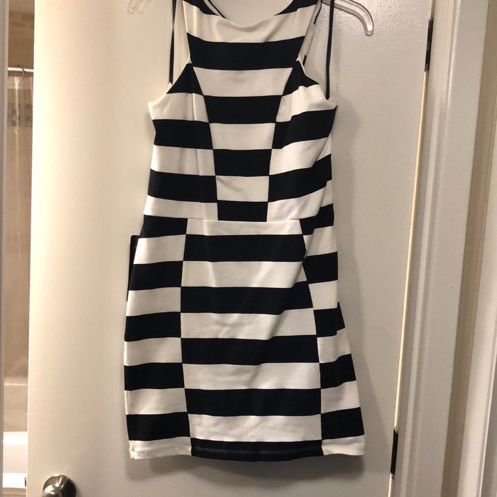 Cross back checkered Bebe dress